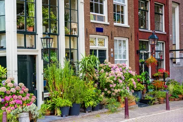 Fotobehang Beautiful house in Amsterdam © Sergii Figurnyi