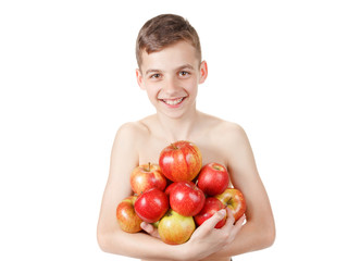 Teen boy with a pile of apples