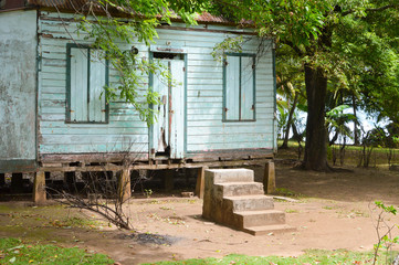 Fototapeta na wymiar Traditional wooden house of Creole people living on the Caribbean coast of Nicaragua. Great Corn Island
