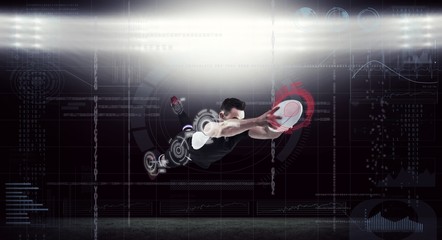 Composite image of rugby player scoring a try