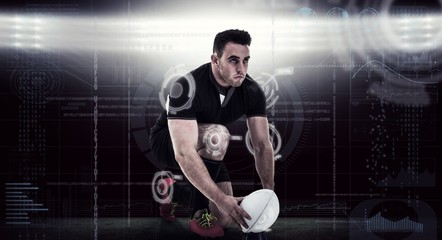 Composite image of rugby player getting ready to kick ball