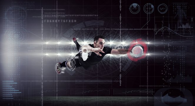 Composite image of rugby player scoring a try