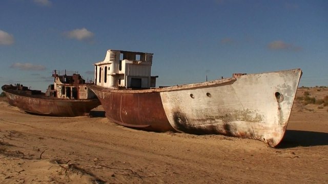 Old abandoned ships signify the ecological disaster that is the Aral Sea in Kazakhstan or Uzbekistan.