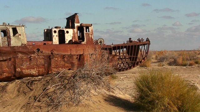 Old abandoned ships signify the ecological disaster that is the Aral Sea in Kazakhstan or Uzbekistan.