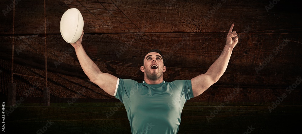 Poster composite image of rugby player cheering and pointing