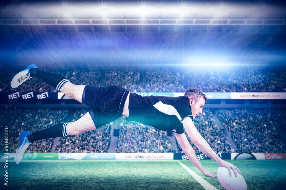 Poster composite image of a rugby player scoring a try