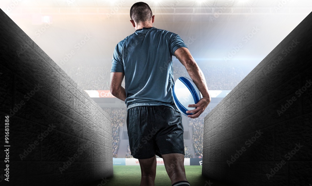 Poster composite image of rear view of rugby player running with ball