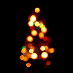 Bokeh silhouette of Christmas tree
