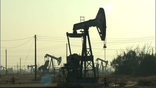 CU Oil field pump jacks pumping oil