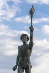 Fototapeta premium View of The cursor (torchbearer) in Rio- Antirio in blue sky