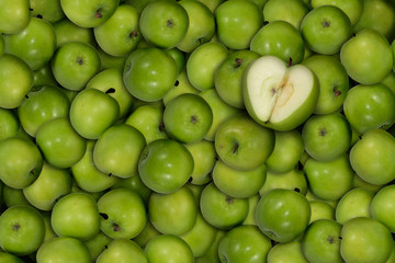 pile of green apples with the green apple heart on top