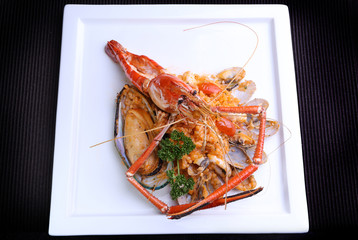 Seafood Risotto on white plate, popular international food from rice