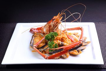 Seafood Risotto on white plate, popular international food from rice