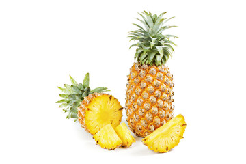 Pineapple with slices on  white background.