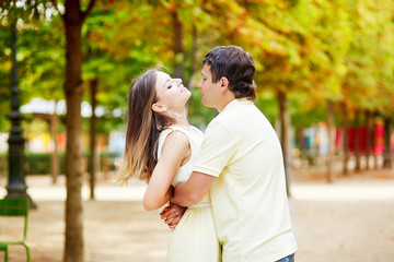 Fototapeta premium Beautiful young dating couple in Paris