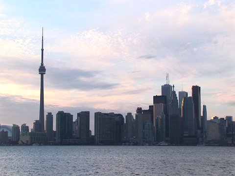 Toronto's CN tower dwarfs the remaining skyscrapers in this Toronto skyline picture.