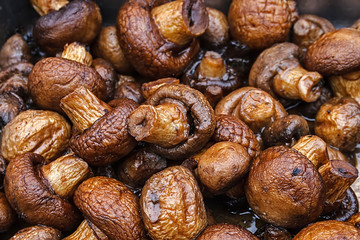 Plenty of mushrooms fried for to be served.