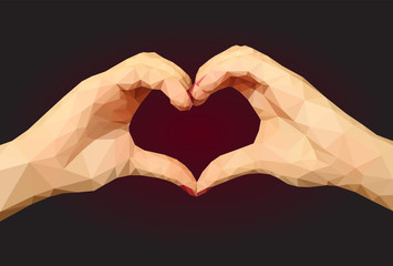 Fototapeta premium Two polygonal hands folded in the form of a heart on a black bac