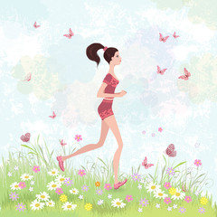 Obraz na płótnie Canvas Sporty brunette jogging in the park