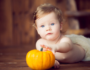 baby and pumpkin