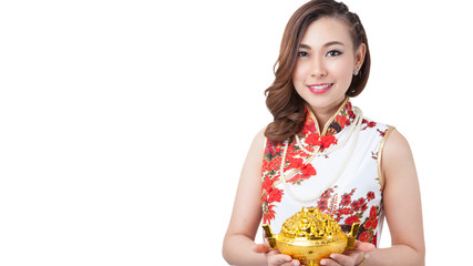 Happy chinese new year. beauty woman showing gold
