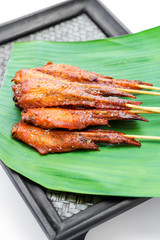 Fresh made chicken wing satay skewer