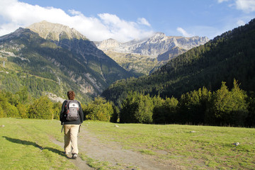 Woman walking in the mountain