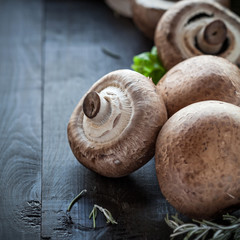 Fresh portobello on wooden background