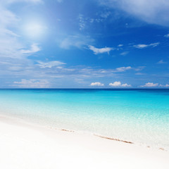 Fototapeta na wymiar Tropical landscape with turquoise sea and white beach