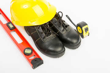 Yellow hard hat and tools