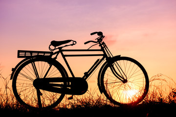 Fototapeta na wymiar beautiful landscape image with Bicycle at sunset