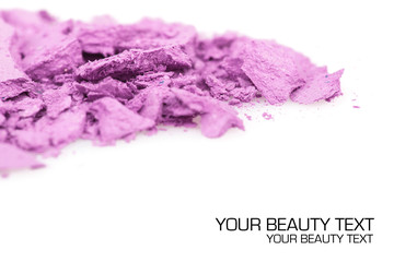 Crushed eyeshadows on white background