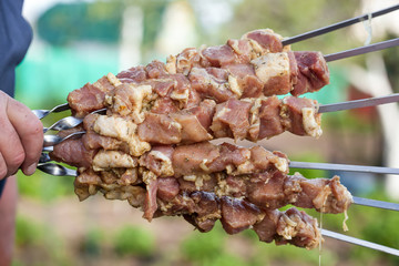 Skewered marinated raw pork