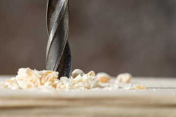 Drill with sawdust