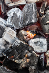 Burning  coal in barbecue