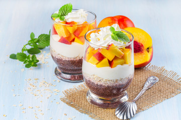 Chia seeds with oat flakes and peaches. Horizontal image.
