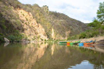 Fototapeta na wymiar Coroful boats in Somoto Canyons, treasure of the Northern highlands of Nicaragua