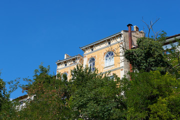 Fototapeta na wymiar Roofs of old houses