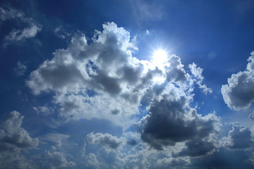 Naklejka na ściany i meble Blue sky with cloud and the sun.