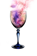 brandy cognac glass with colorful  smoke