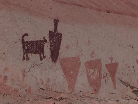 A slow zoom into mysterious petroglyphs in the Southwest desert of the USA.