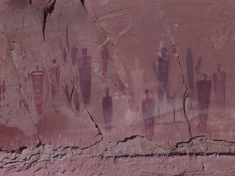 A slow zoom into ancient and mysterious giant petroglyphs in Canyonlands National Park, Utah.