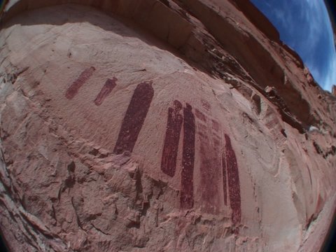A fisheye shot of mysterious ancient petroglyphs in Canyonlands National Park, Utah.