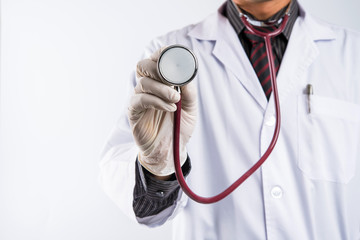 doctor holding stethoscope with white background