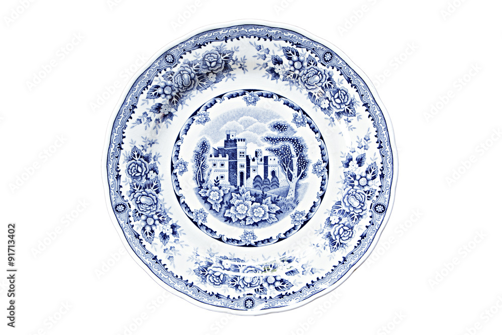 Wall mural vintage dish isolated on white.