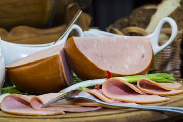 sausage on a wooden plate in a restaurant