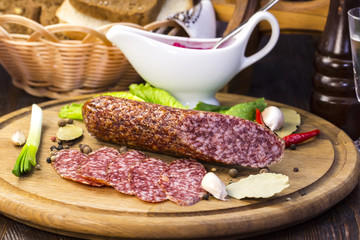 sausage on a wooden plate in a restaurant