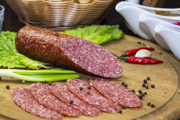 sausage on a wooden plate in a restaurant