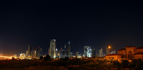 Dubai skyline at night. Dubai financial center, UAE