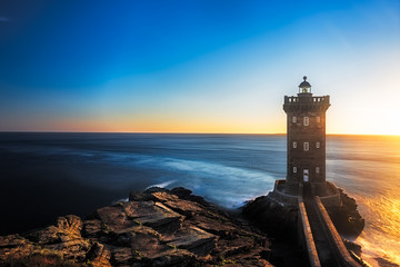 Kermorvan Lighthouse before sunset, Brittany, France - obrazy, fototapety, plakaty